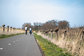 Bicycle lane (fietspad) in a Dutch meadow (Zuid-Holland, The Netherlands)