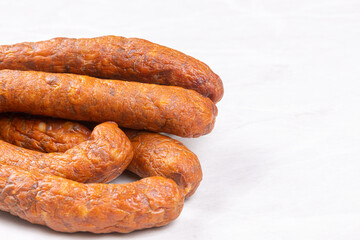Homemade fresh raw smoked sausages with copy space