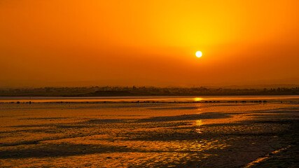 Fototapeta na wymiar sunset on Cyprus, Larnaca Salt Lake