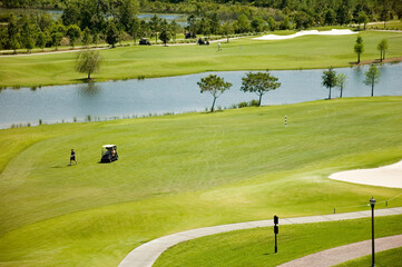 Obraz premium Golf Green with Traps and Carts