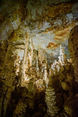 Cave interior with stalactite and stalagmite