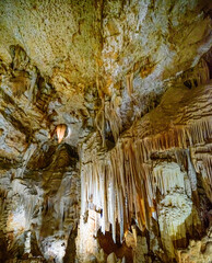 Cave interior with stalactite and stalagmite