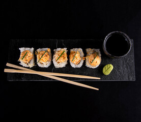 sushi with chopsticks