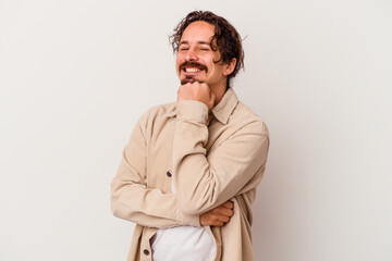 Young caucasian man isolated on white background smiling happy and confident, touching chin with hand.