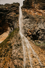 Rinka waterfall located in Logarska dolina national park in Slovenia, Second highest waterfall in Slovenia. Popular hiking destination in the Alps © Zedspider