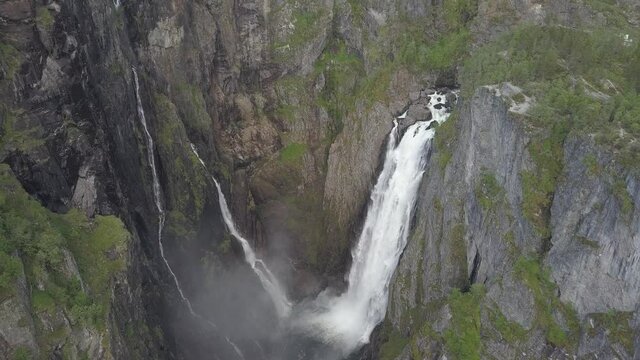 Large waterfall in valley in Norway