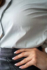 girl in office clothes: leather skirt and white shirt