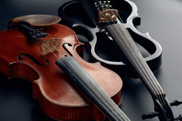 Wooden retro violin and modern electric viola