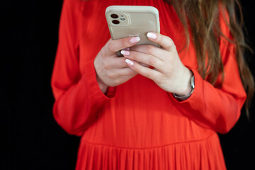 girl in red dress with phone