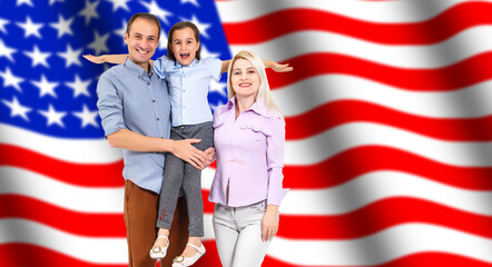 portrait of beautiful modern american family with USA flag.