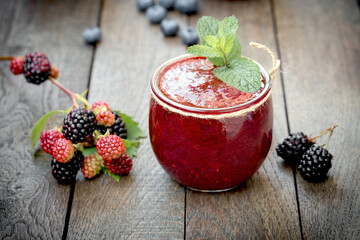 Healthy smoothie, homemade blackberry smoothie on wooden table
