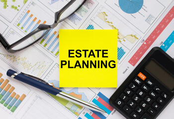 Sticker with text Estate Planning with, glasses, pen and calculator