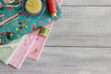Fabrics and sewing accessories for needlework.