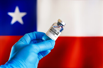 vial of vaccine for the vaccination against coronavirus plan in Chile. Doctor with vial of the...