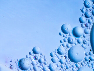 Beautiful oil colors of the universe. Bright colored bubbles sparkling. Abstract Acrylic Liquid Painting Texture. Macro Background Wallpaper. Oil Ink Acrylic Paint Spread Blast Explode Galaxy 