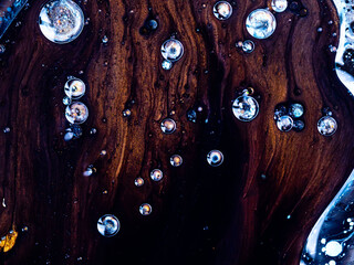 Macro Close Up Shot Of Golden Wet Glitter. Colorful Space Glittering Particle Background. Golden...