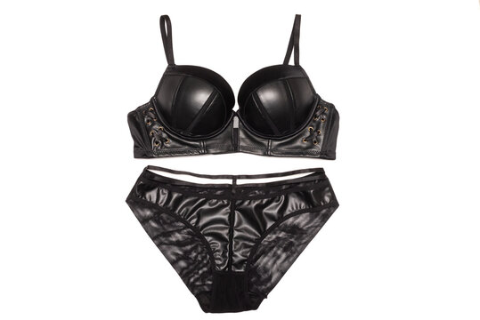 Black leather bra and panties isolated on the white background.