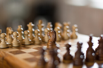 Shot of a chess board white horse moving. Business leader concept.