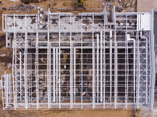 Aerial flight over a construction site.Building frame.Top view.Aerial photo