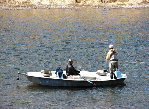 Angler casts a line into the Mossouri river