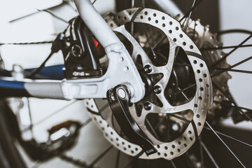 Rear wheel of road bike. Disc brakes and sprocket.
