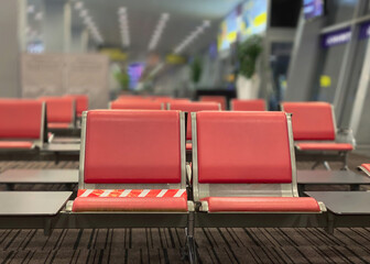 Close-up of airport seats in the waiting room.  Tourism and travel concept.