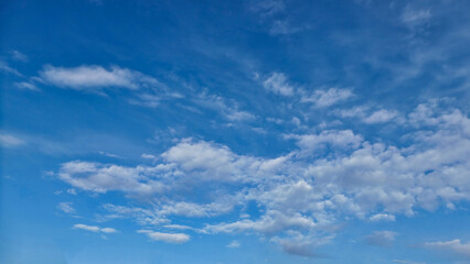 blue sky with beautiful streaming clouds