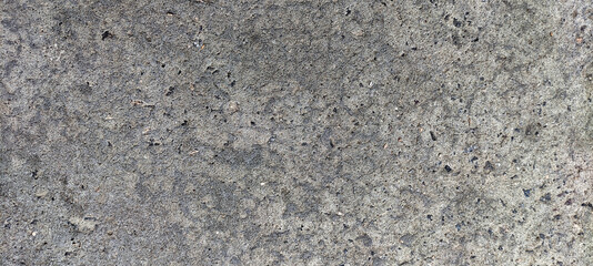 A view of the texture of the gray concrete. Gray background