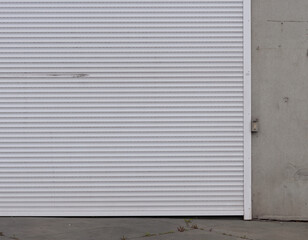 Obraz na płótnie Canvas metallic white garage or warehouse door 