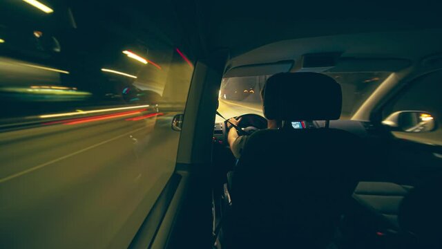 Night hyperlapse inside the car on highway and city traffic