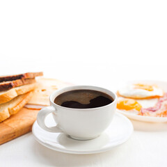 Breakfast with coffee on table