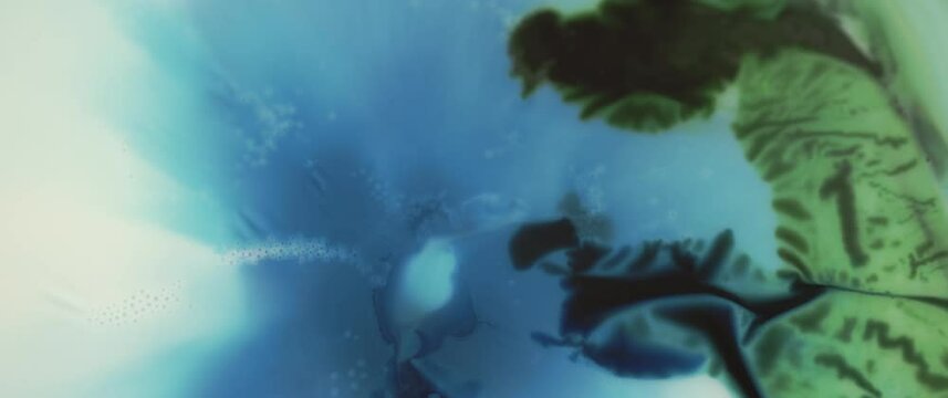 Macro Textures with Vibrant Neon Color Palette. Abstract Background Made with Oil Mixed with Dye, Ink, and Paint.