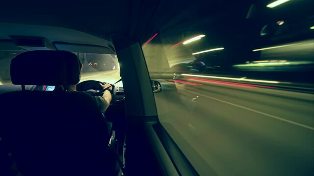 Night hyperlapse inside the car on highway and city traffic