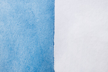 An abstract hand drawn blue watercolor background