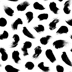 Obraz na płótnie Canvas Big dots vector seamless pattern. Polka dot motif wallpaper. Abstract pattern of bold black shabby dots or spots on white background. Hand drawn black ornament for wallpaper, textile and fabric design