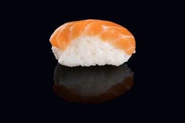 salmon niguiri isolated on black background