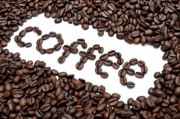 Coffee word, frame made from roasted coffee beans on white