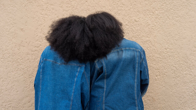 Portrait of sisters with afros