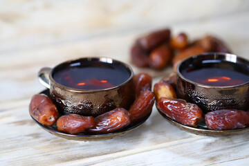 Date tea in cups. Dried dates. Ramadan.