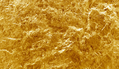 Shiny yellow leaf gold foil texture