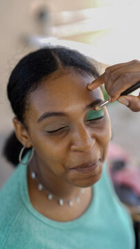 Closeup Portrait Of Beautiful Woman With Bright Green Eyeshadow