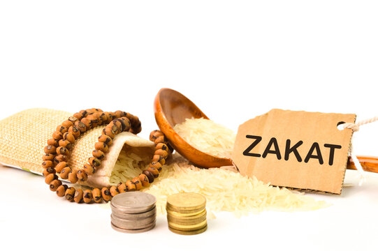 Concept Of Zakat In Islam Religion Selective Focus Of Money Rice Koran And  Prayer Beads On Wooden Background Stock Photo  Download Image Now  iStock