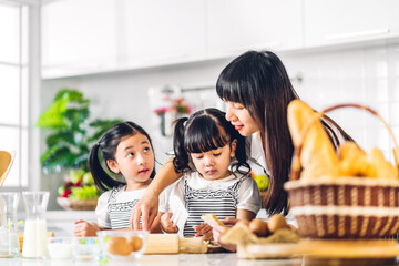 Portrait of enjoy happy love asian family mother and little toddler asian girl daughter child...