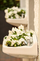 bathroom sink with flowers