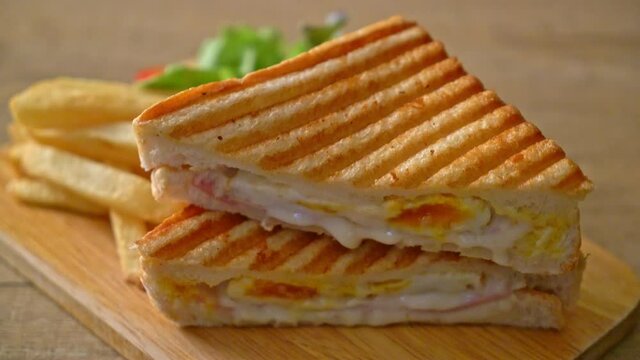 ham cheese sandwich with egg and fries