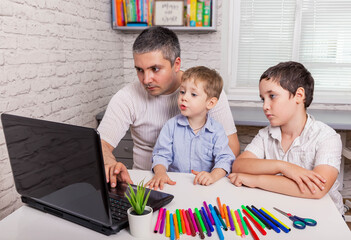 Dad and children making video chat on tablet at home. Funny family are having video call using...