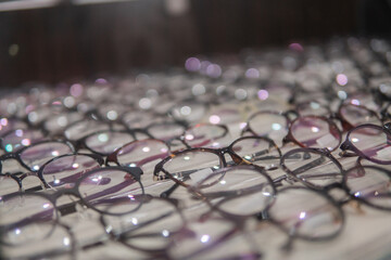 a set of glasses on a special eyeglass shelf in an eye clinic