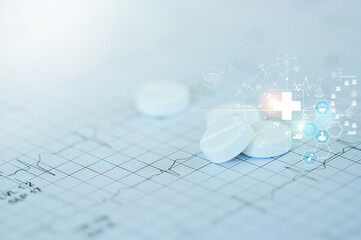 Medicine and heath concept. Pills and icon network medical heath care on doctor heart rate report background.
