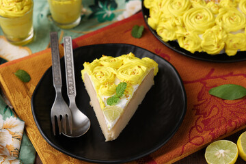 cake piece  of lemon cake home made baked sponge lemon cake bakery Kerala India Sri Lanka for birthday special occasion anniversary cake pastry with lemon yellow frosting .