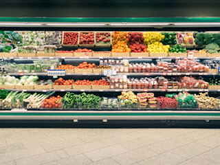Fresh vegetables on shelf in supermarket for background - obrazy, fototapety, plakaty